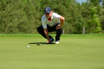 Collin_s lining up a putt