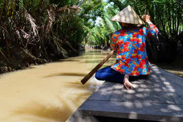 paddling through the mekong canals